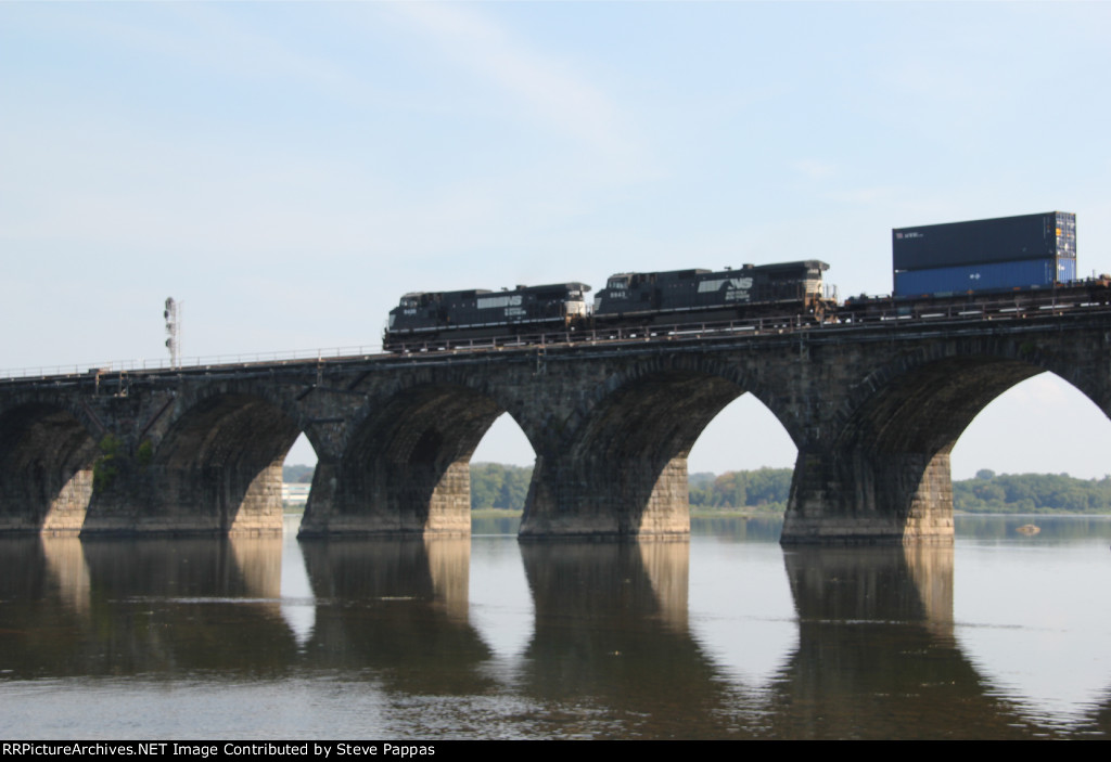 NS 9428 and 9943 take an eastbound over Rockville bridge